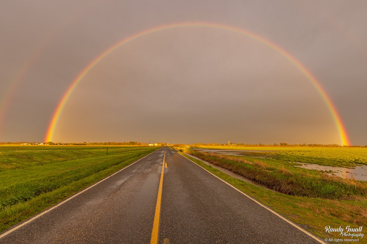 RandySmall's tweet photo. Tonight's Easter rainbow from Pangborn Road near Lynden, WA!!! This was one of the best ones that I have ever seen and my wide-angle lens could not capture the full double in it. #wawx #pnw https://t.co/mu6cRJ2ySX