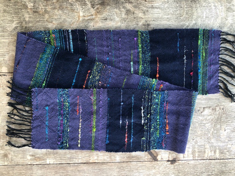 weaverHG's tweet photo. Trio of purple scarves woven on fine black cotton warp on my Saori loom. Experimenting with various levels of restraint in what got added for colour and texture #SaoriWeaving #Weaving #Saori https://t.co/Kvg7RS4JhD