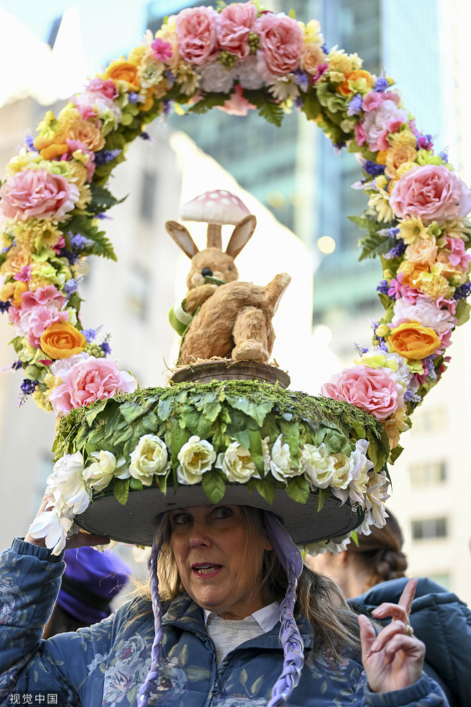 ChinaDaily's tweet photo. People wear colorful bonnets during the annual Easter Parade on the Fifth Avenue in New York on April 9, 2023. https://t.co/U8dg8QkGFe