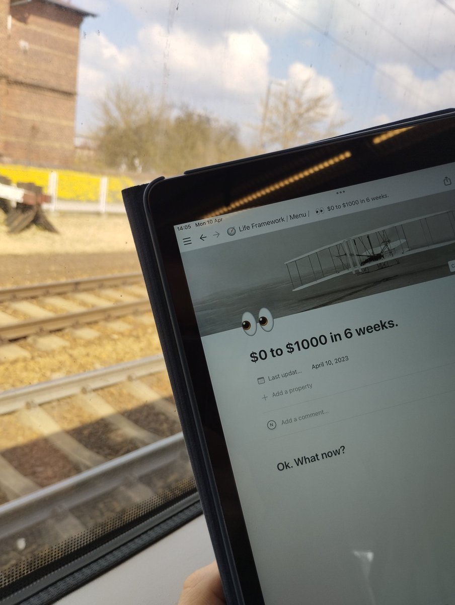 Picture taken in train showing a Notion page with title "$0 to $1000 in 6 weeks" and heading "Ok. What now?".