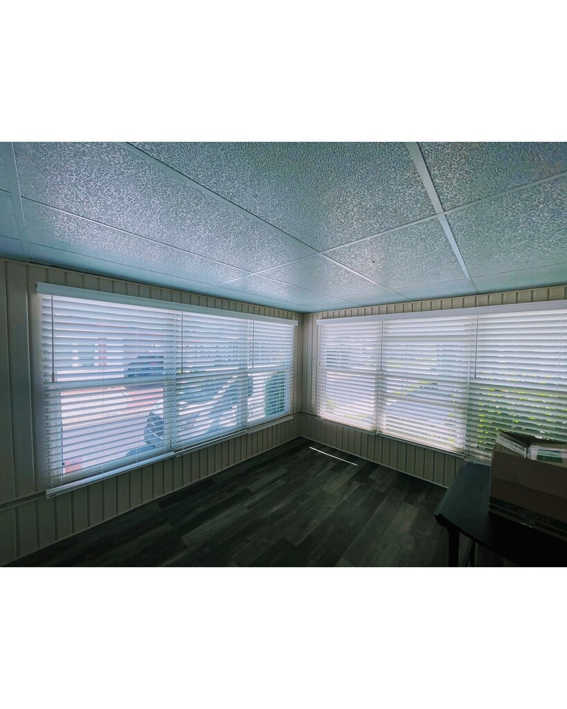 Updating your sunroom is easy with a simple window treatment upgrade. Cordless faux wood blinds are budget friendly and child safe. Contact Budget Blinds of North St Petersburg to schedule your free design consultation, today! #budgetblinds #homeupgrade #stpetefl