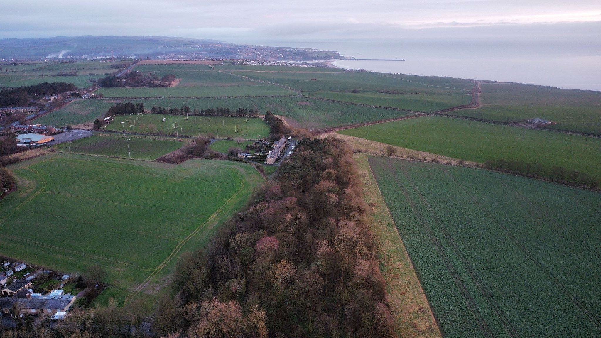 The shaft was located behind the cottages in the centre of this aerial shot. The route of the Scremerston Waggonway can clearly be seen. 