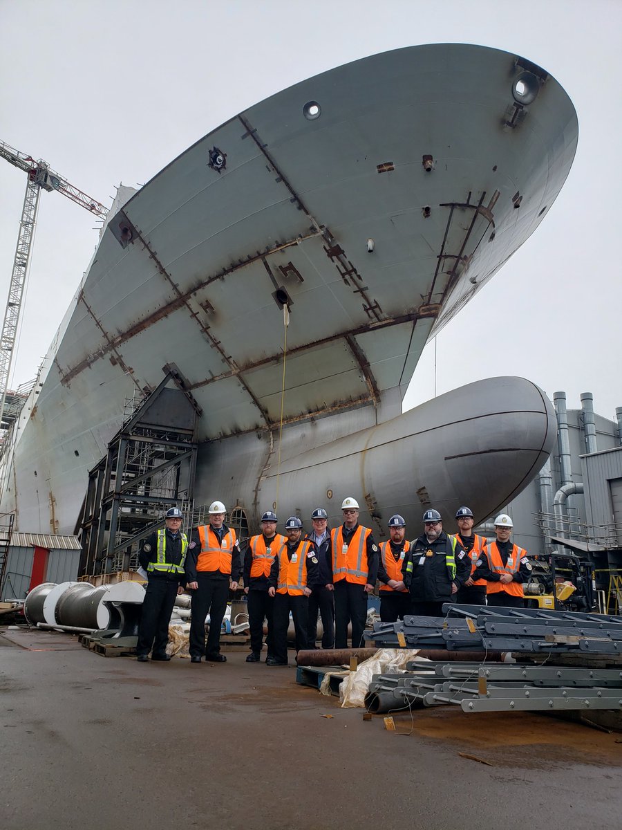 RCNintheUSN's tweet photo. Had a great outing a week ago, where the Fleet Chief and I, along with several PRO sailors and a few Fleet Bosn's had the opportunity to visit JSS 1 (aka the future HMCS PROTECTEUR).  Happy to report that the hull is now in one full piece...and it is simply massive. https://t.co/cB44idZUzi