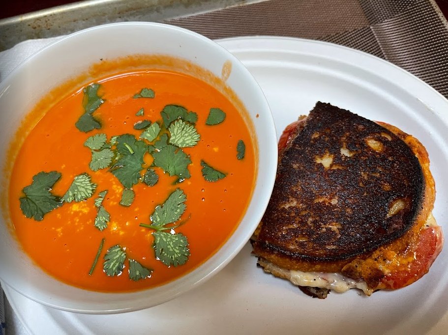 The perfect combo for tomorrow's National Grilled Cheese Sandwich Day: a grilled cheese sandwich and hot, steamy bowl of tomato and red pepper soup on the side. Comfort food at its finest! 😋

#GrilledCheeseDay #ComfortFood