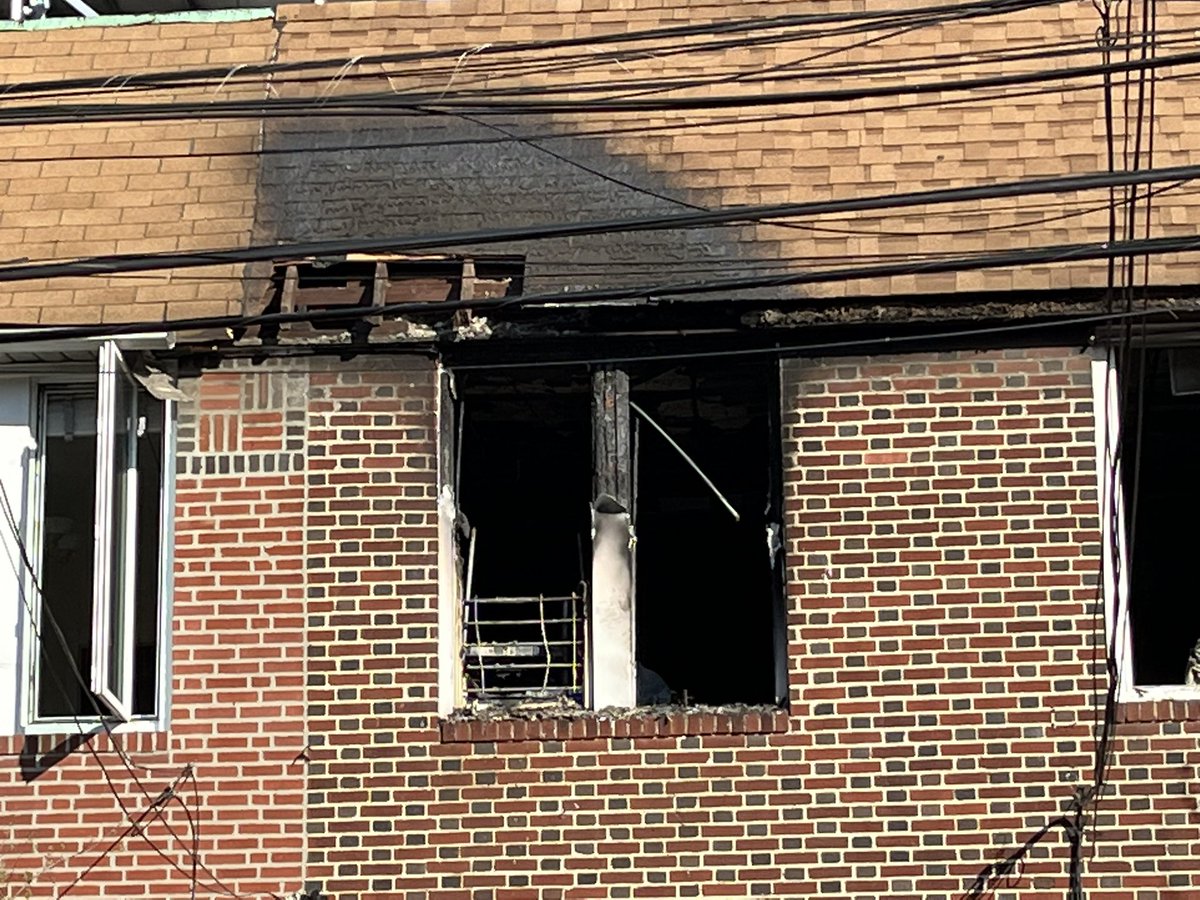 FDNY says a charging e-bike battery ignited a fire at the front door to this home in Astoria, trapping the family upstairs. A brother and sister died, 7 and 19 years old. Others jumped out a window into neighbors’ arms below.