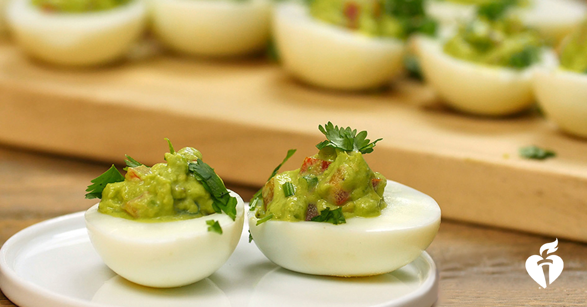 AHACalifornia's tweet photo. Who said eggs are just for breakfast?  Be #HealthyforGood anytime of the day with our tasty Guacamole Deviled Eggs. Grab the recipe here: https://t.co/MyQ1Pkp7gd. https://t.co/Zw0HHMbVft