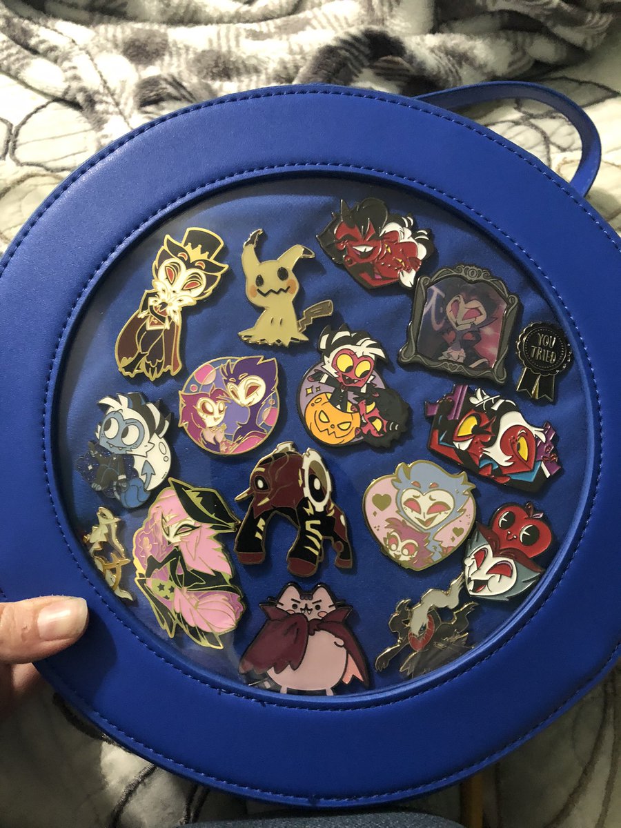 Spooky_Imp's tweet image. Here’s my animal crossing ita bag with my pins from #defensegrid #pokemon #pusheen #HelluvaBoss  this has always been a hobby of mine ^^