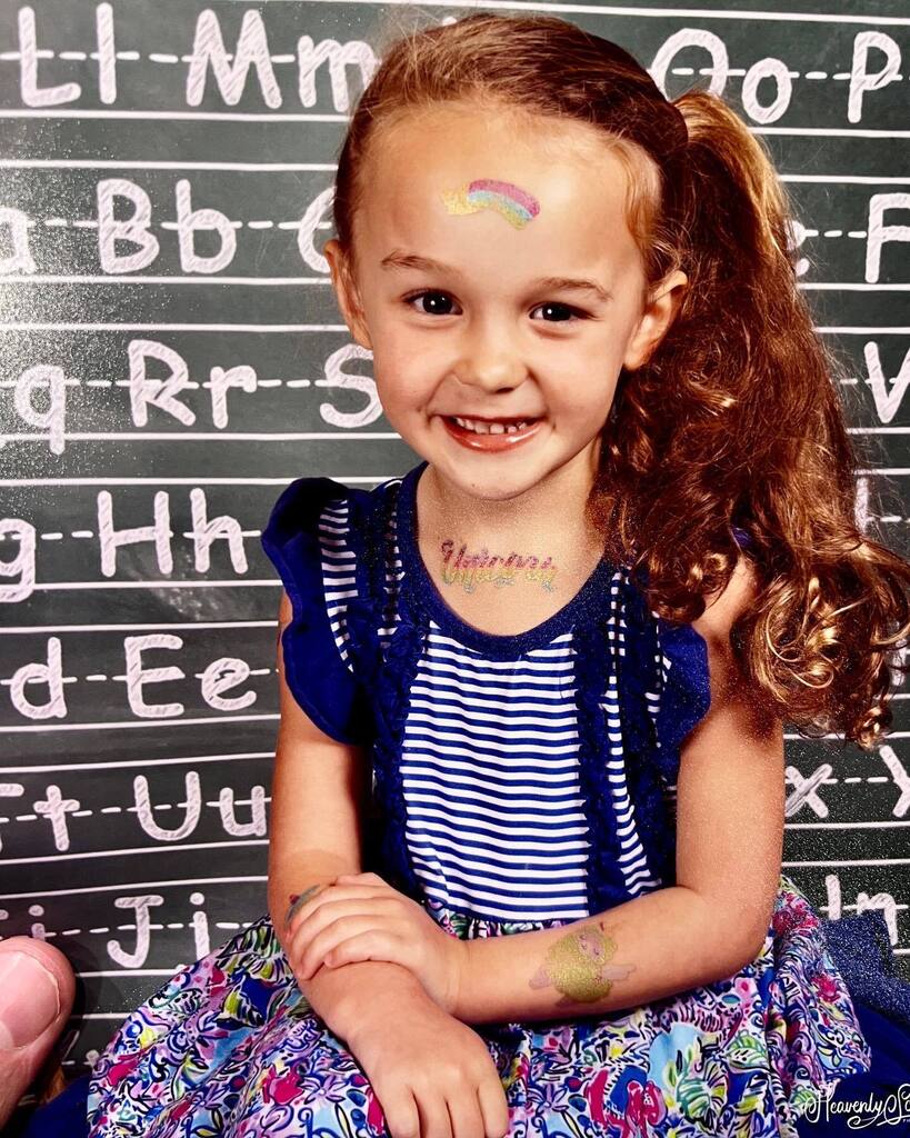 Olivia’s school pictures are in… I’m so glad <a href="/ginamflowers/">GIna m flowers</a> forgot about those when Olivia asked for face and neck tats. Baby O was so proud of herself here, and as her neck says, she’s our little Unicorn. instagr.am/p/Cq4D3IQMP4c/