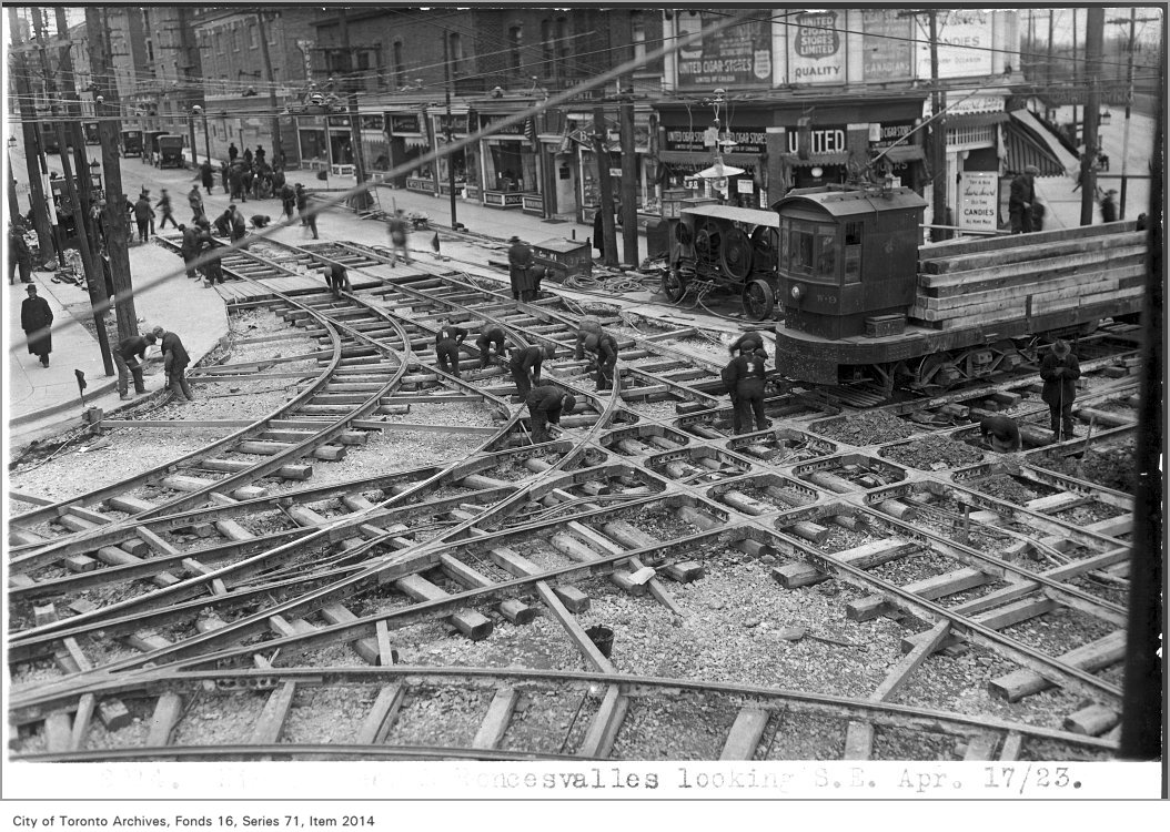 TorontoArchives's tweet photo. P is for Parkdale. Guess what was happening at the intersection of Queen Street, King Street and Roncesvalles Avenue 100 years and one day ago? They were fixing the streetcar tracks! https://t.co/iePW7xG3Y9 #ArchivesAtoZ #Parkdale #TorontoHistory #TorontoArchives https://t.co/Zw7YwEonlV