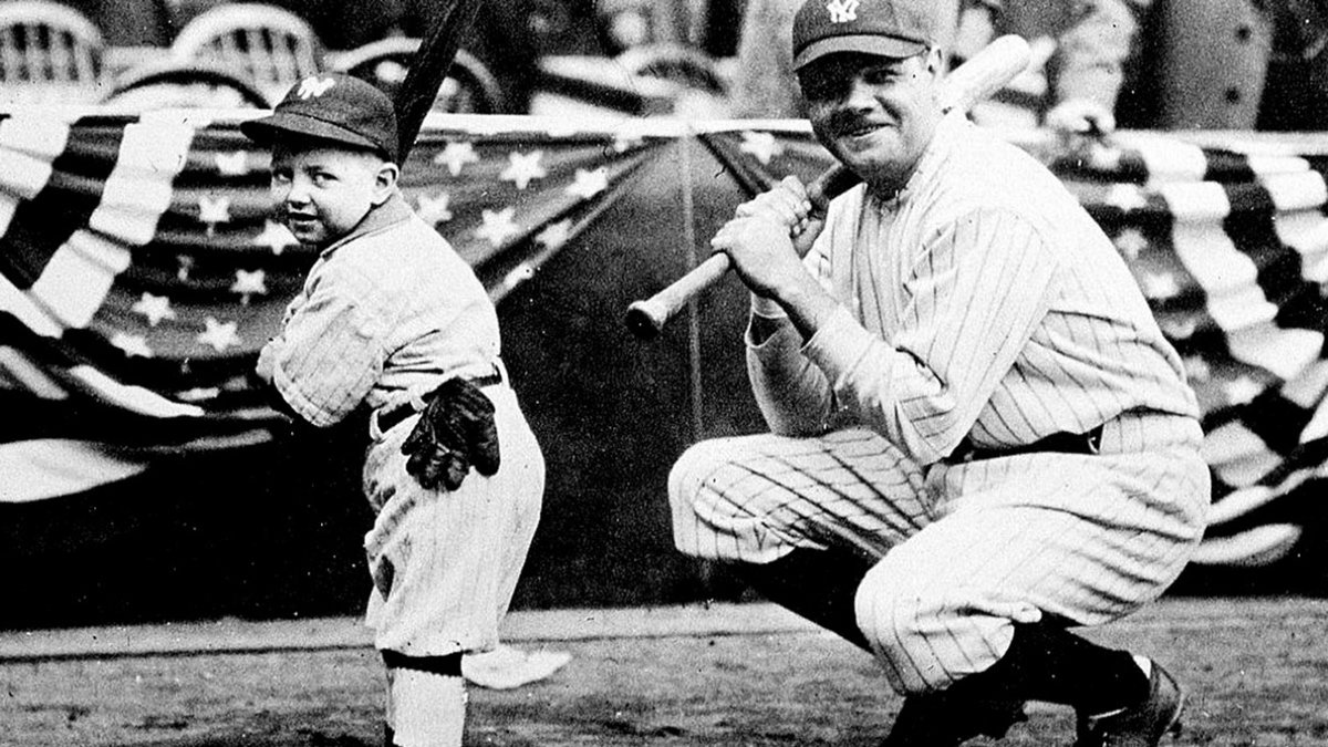 100YearsAgoNews's tweet image. April 18, 1923: The first game is played at Yankee Stadium. A crowd of 74,217 flocks to the Bronx to see the home team win, 4-1. Babe Ruth hits the first home run there, helping beat his old team, the Boston Red Sox. He’s seen touching home and with bat boy Ray Kelly. 1/5