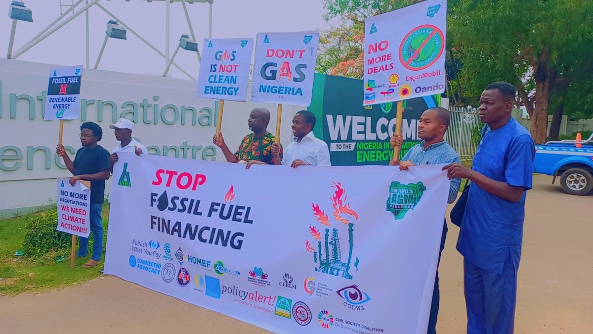 aneejnigeria's tweet photo. Ongoing at the entrance of Abuja International Conference Centre: @agm_the led by ANEEJ Programme Manager, @ighodi, holds #StopFossilFuelFinancing campaign to send strong messages to @NGRPresident, Oil multinationals & Investors to direct their investment towards renewable energy https://t.co/amCZ7y6zLB