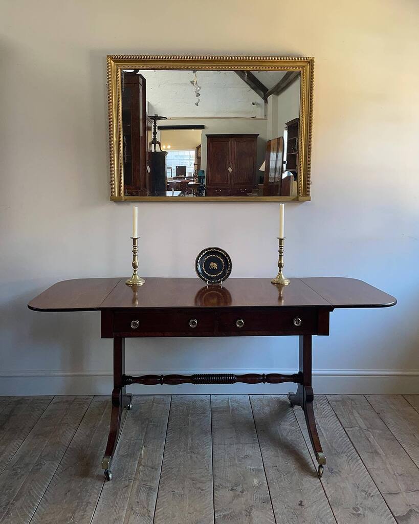 Fine quality Regency mahogany sofa table. Figured drop leaf top with ebony inlaid moulding, over two ebony strung drawers fitted with brass knobs. Dummy drawers to the reverse, raised on square supports joined by a ring turned stretcher, over ebony inlai… instagr.am/p/CrLMJkFIGtT/