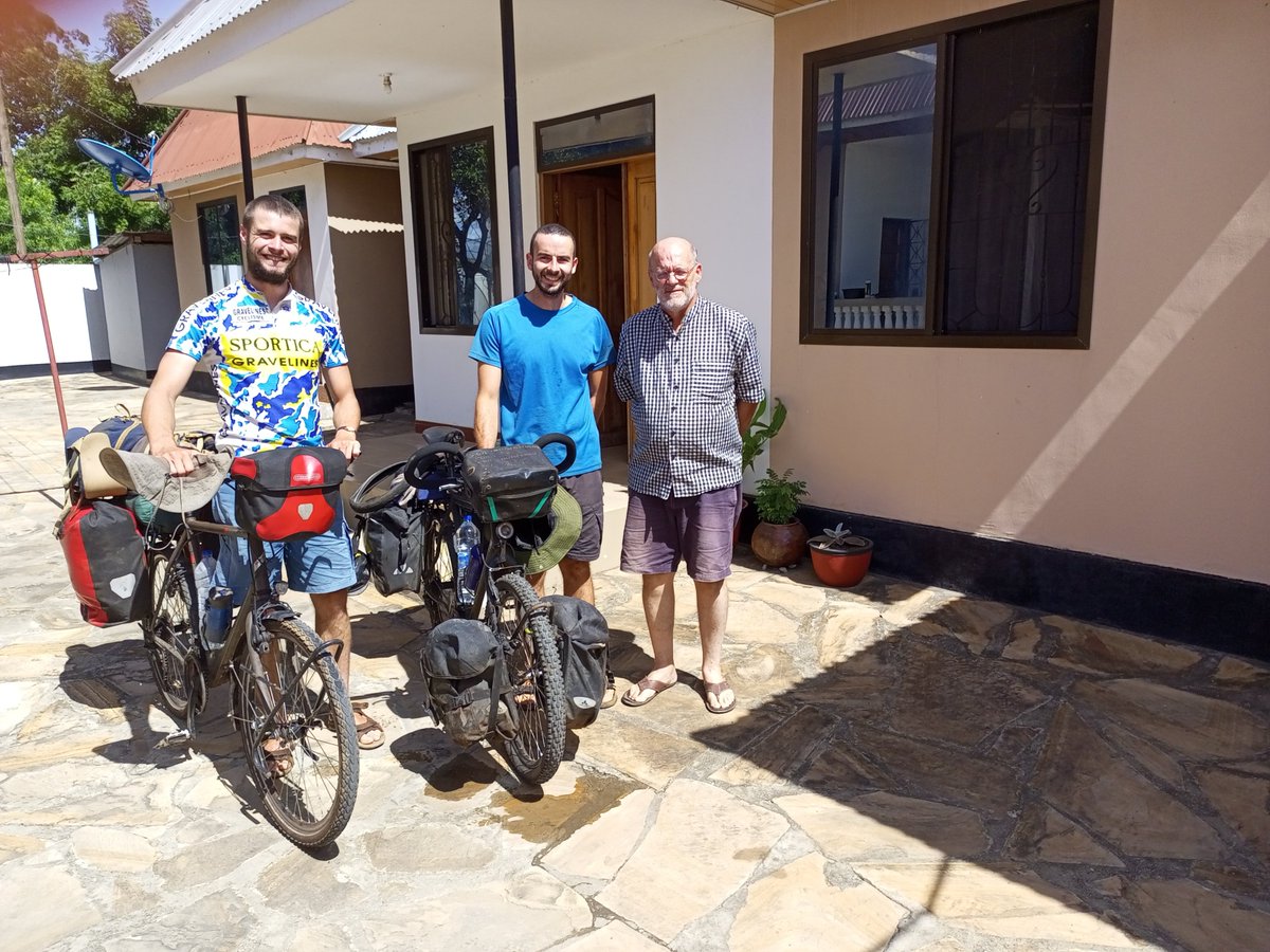 DontjeJames's tweet photo. #30DaysofBiking  Day 10. Bikers in Tanga come from many places.  Ferdinand (left) and Dimitri from France passed through Tanga on their way from Nairobi to Johannesburg.  In the afternoon, my ride for the day took me to the ocean to watch other non-motorized transport. https://t.co/jbu1hU6Ed5