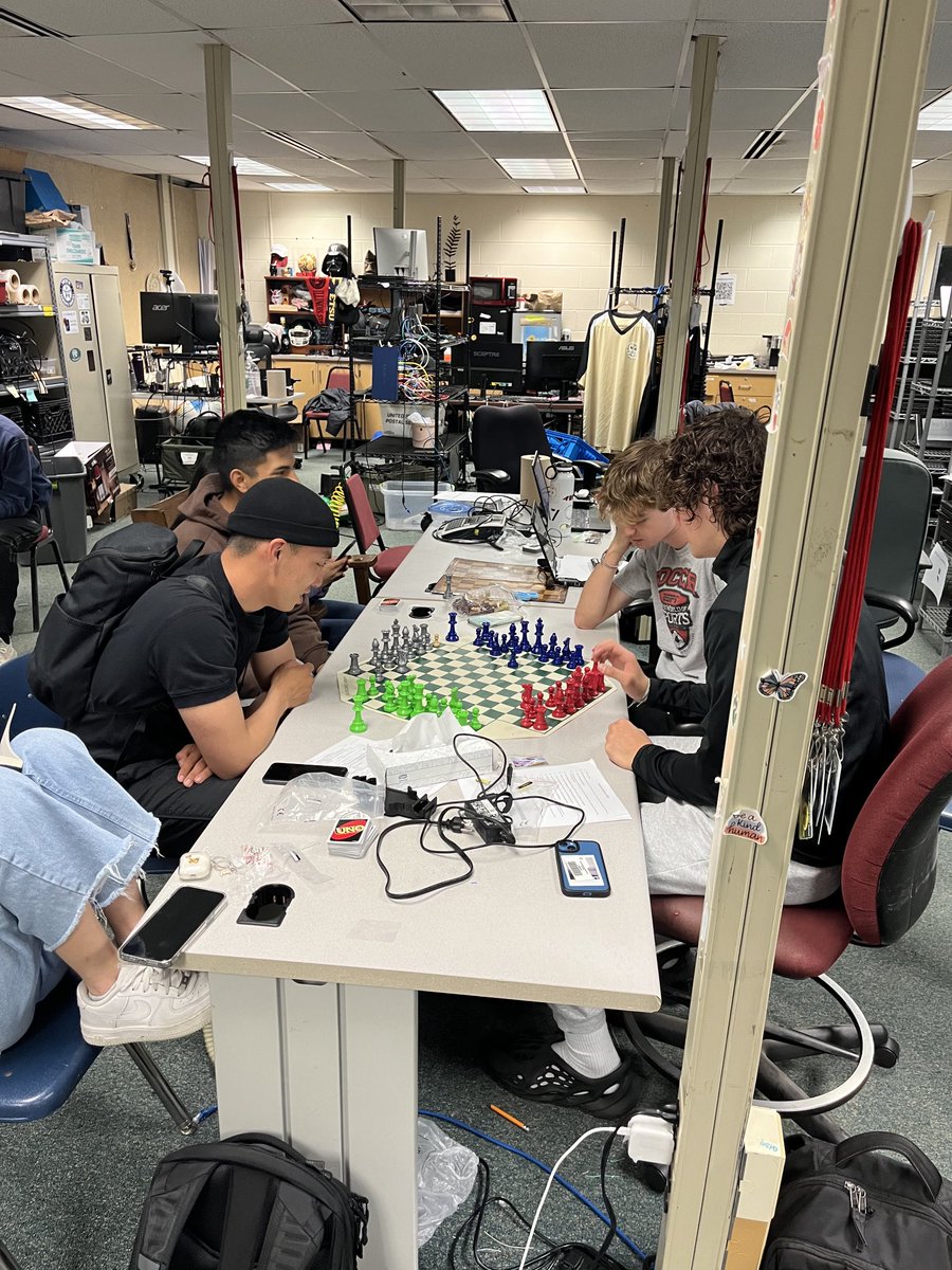 Players beating Coach Elzat in chess!