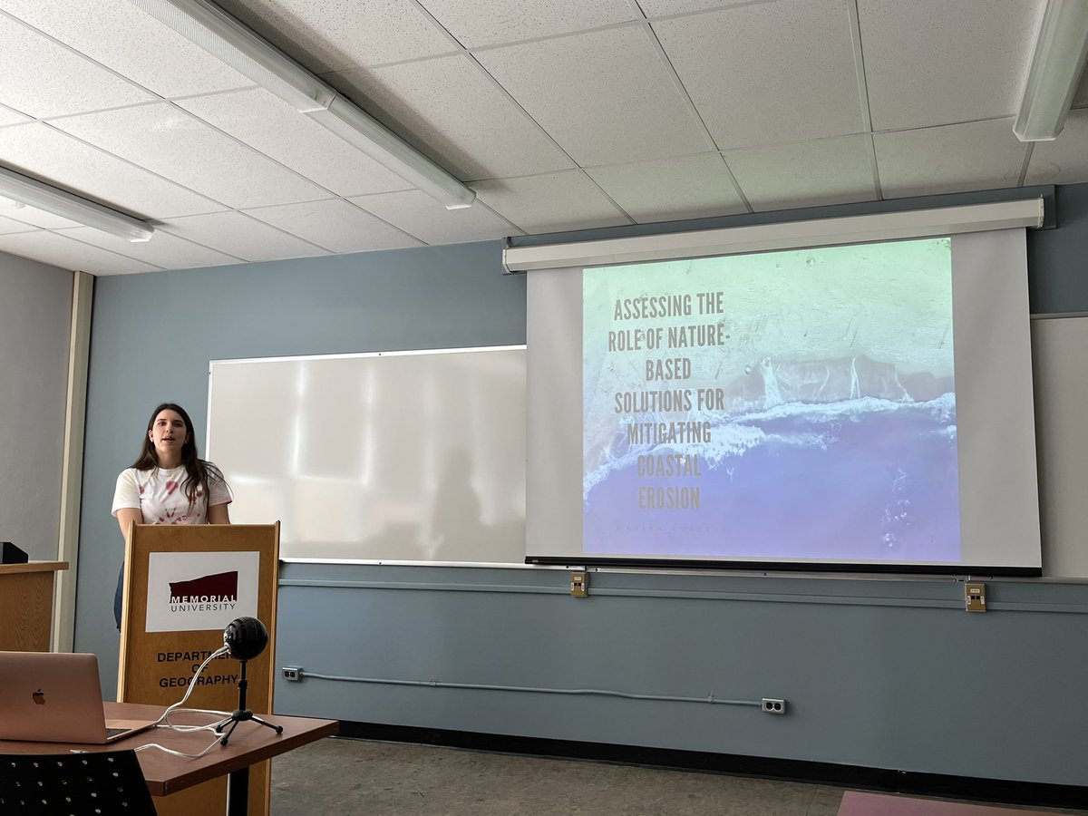 MUNGeog's tweet photo. Final talk of the day! PhD candidate @MCuselli presents her proposed research w/@rangeshifts &amp; J Daraio: Assessing the role of nature-based solutions for mitigating coastal erosion. Marina is looking at where and how plants can be used to mitigate coastal erosion in Newfoundland. https://t.co/m4jUp7huCv