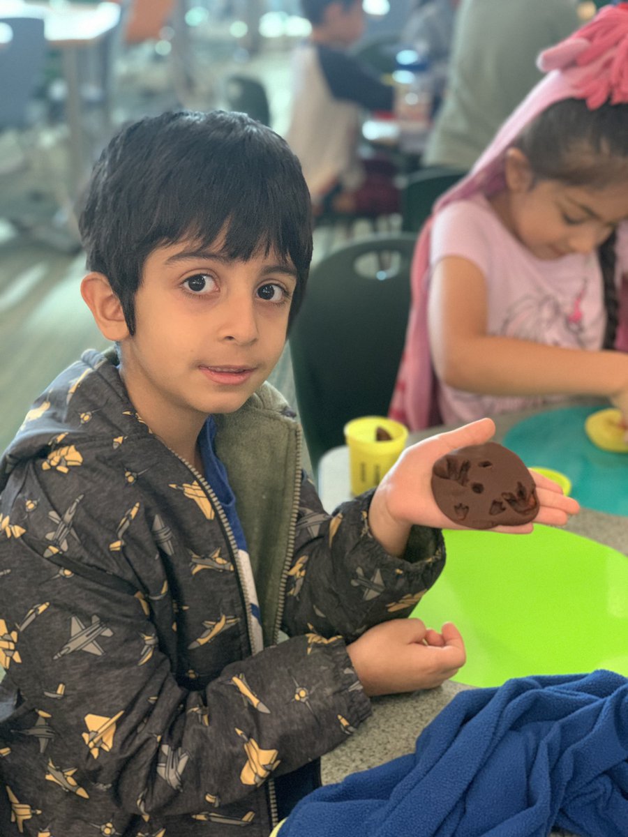 RAWR! 🦖 Kinder students leaned about fossils and made their own with play-doh and dinosaurs! #laslomaslibrary #neisdlibs @neisdlibrary @laslomaspta