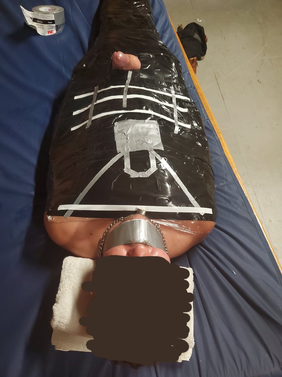 BothKindsOfDM's tweet photo. Mummification Class at Delta Sept '22. First time this handsome boy was mummified. Lock to match his collar, grid to see how far he'd shoot... if I allowed it.

I think he liked it. https://t.co/k4FLq46vX3