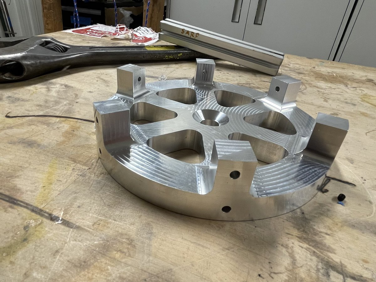 uwsarp's tweet photo. The first part of our newest testbed vehicle, Pocket Rocket, is now complete! This thrust plate will be critical to testing our experimental systems like cold gas thrusters, a propulsively landed payload, and an autonomously guided recovery system https://t.co/oBIak9L3xj