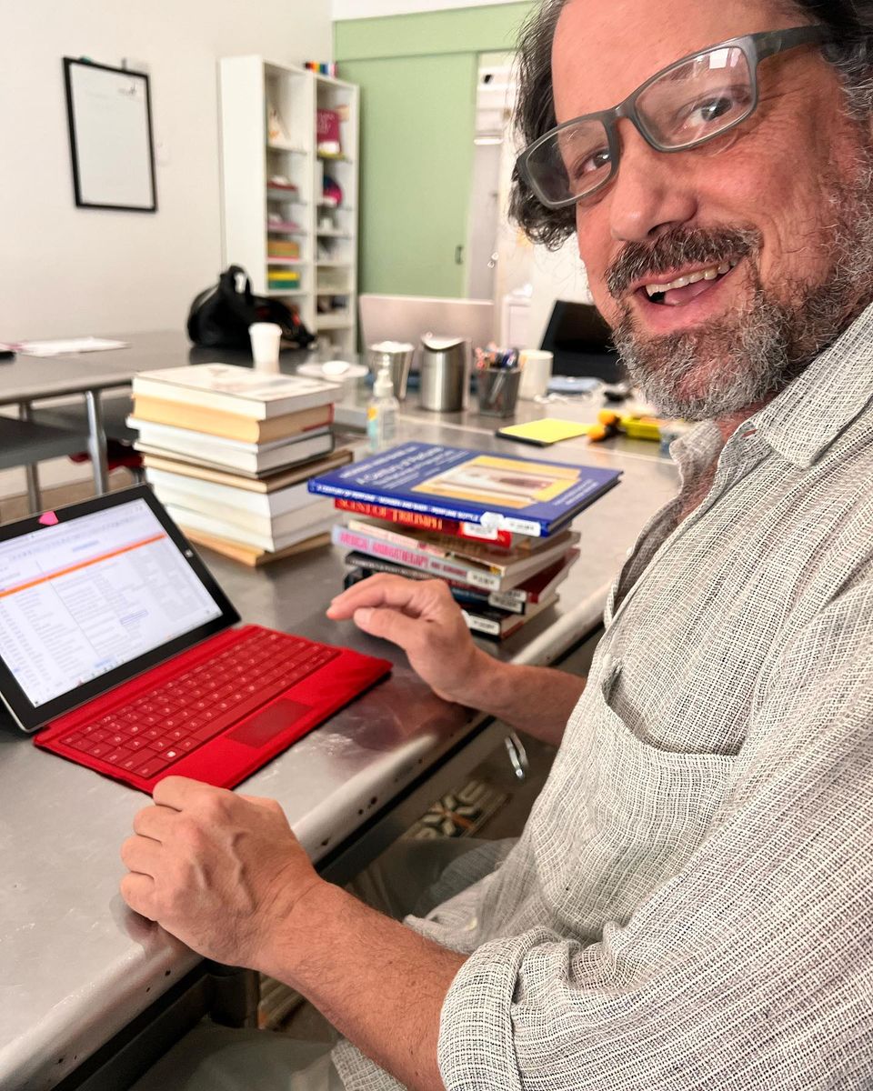ArtandOlfaction's tweet image. Our intrepid de facto volunteer librarian Charles Rosenberg hard at work cataloguing our books and entering them into the @ArtandOlfaction Library Thing account. @LibraryThing is a cataloguing and social networking site for book lovers, and it’s pretty cool. #opensourcelibrary