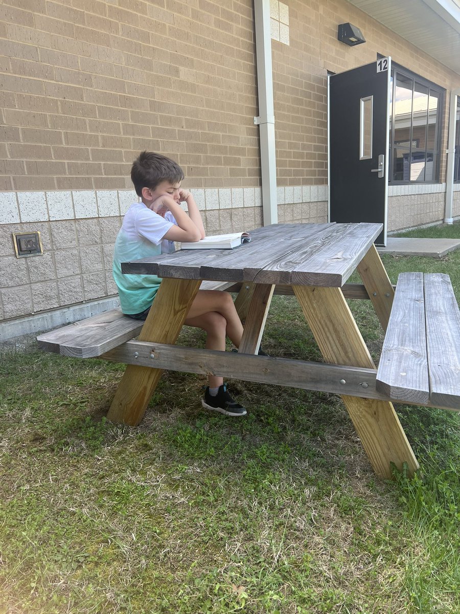 Enjoying this beautiful day with some reading outside! #SCEsoars <a href="/sce_reads/">Stone Creek Library</a>
