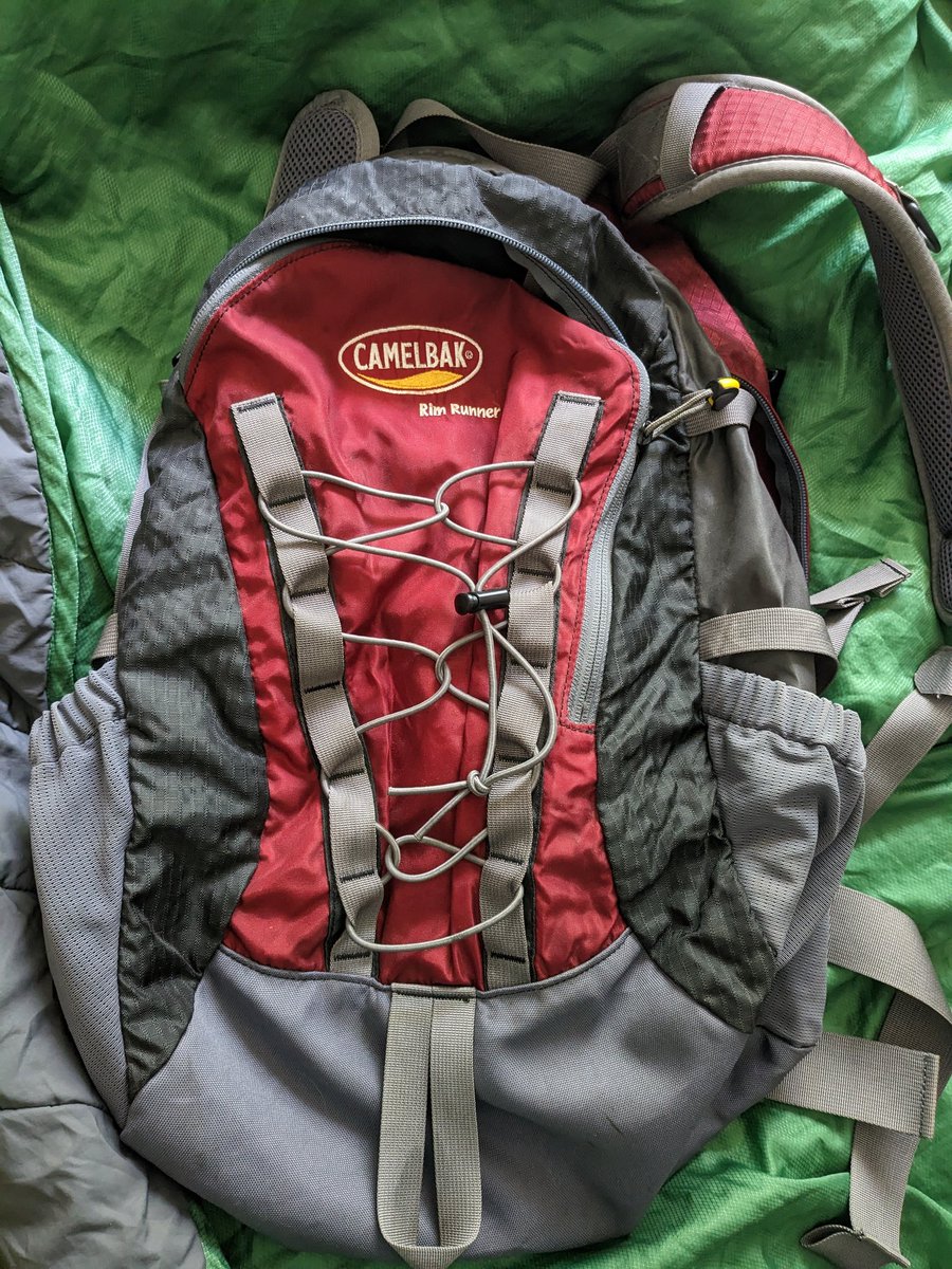 chadgcummings's tweet photo. @twostepinn Can I bring my 25 year old CamelBak rim runner?  It only has two pockets, but it's backpack sized https://t.co/S9Honz63U0