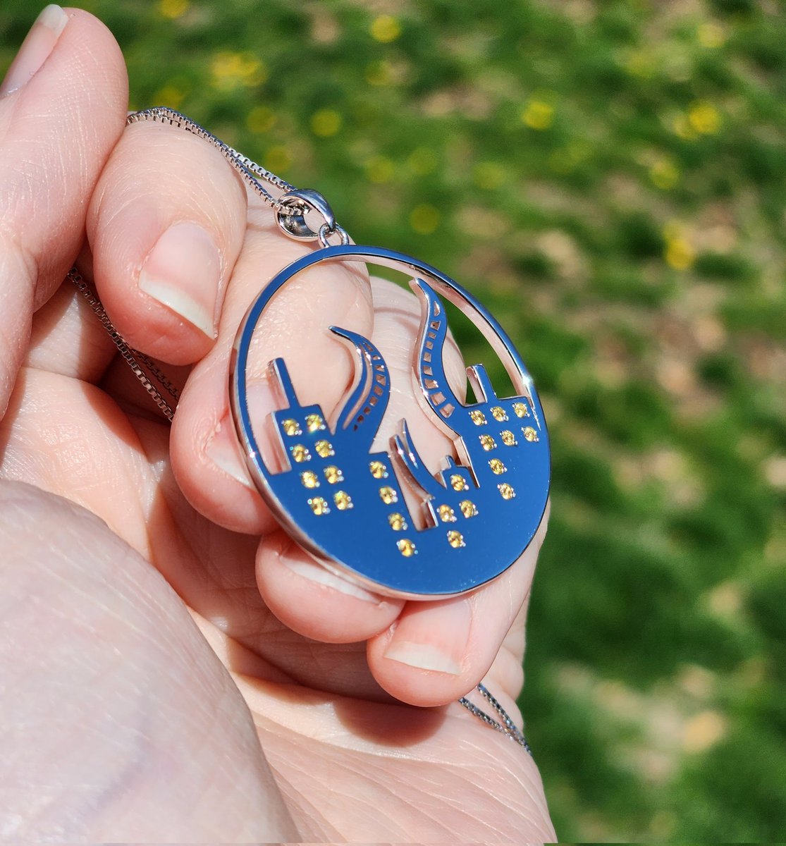 casting_adlo's tweet photo. and the city lights shone through the night, welcoming the Traveler home.

✨ Sterling silver Amaurot pendant, hand set with sparkling CZ
✨ Fully customizable - silver (pictured), gold, rose gold, or gunmetal and your choice of stone color(s) https://t.co/rMgGXZot80