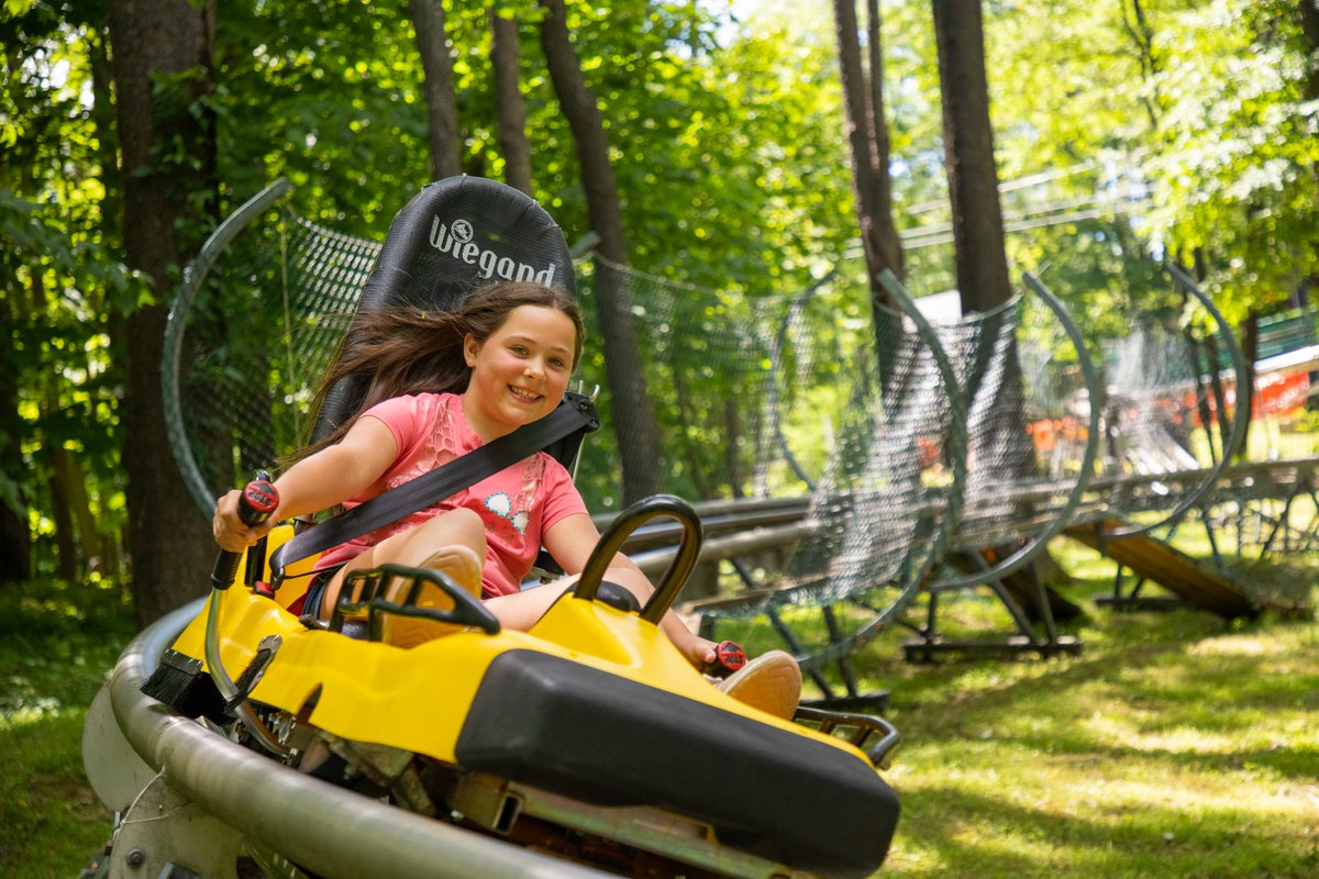 The Wisp Resort Mountain Coaster is a hybrid of an Alpine Slide and a Roller Coaster.  The coaster is an attraction that offers an exhilarating ride down a twisting track within the beautiful mountain terrain.  Now open on Saturdays and Sundays!