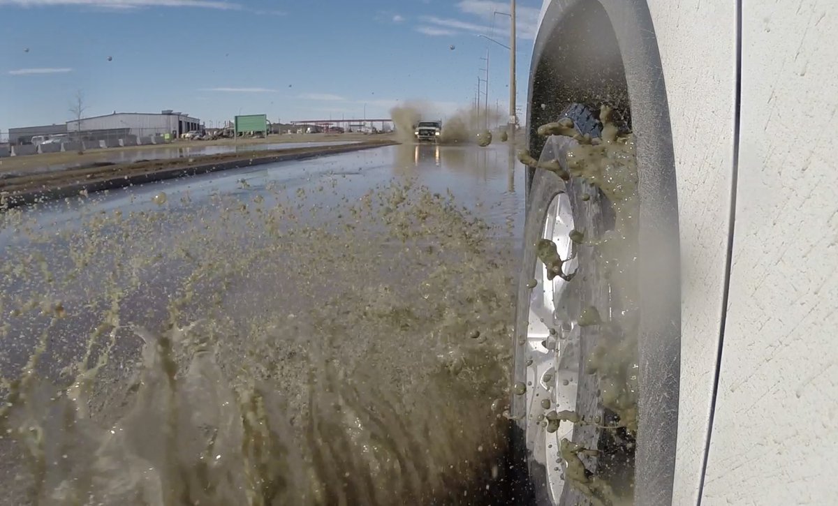 CTVGareth's tweet photo. Playing in Puddles….. that’s my job today.  Huge puddle on Fleet Street North had some drivers turning around…… but certainly not all. #yqrtraffic #yqr #spring #puddles #springpuddles https://t.co/6KAqs0mow7