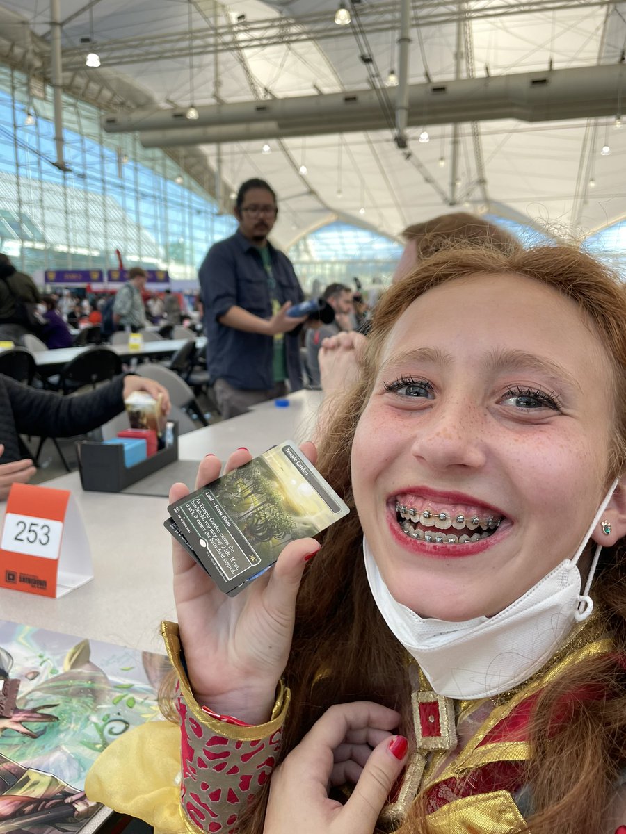 DanaFischerMTG's tweet photo. At @DreamHack #DHSanDiego , in-between rounds I was looking through my bag and I found a single random #MTGUnfinity booster and opened it (because what better way to pass the time than crack packs!) and pulled a Temple Garden! @DreamHackMagic https://t.co/OP3Ij9f5zq