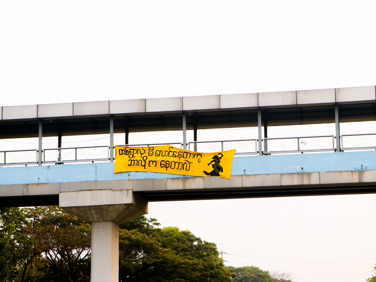 yrfmmofficial's tweet photo. This morning in Yangon, young comrades of Yangon Revolution Force - YRF Soft Strike Community hanged a banner which said “Why Are You Dancing When The Whole Village Is Burning?”. #WhatsHappeingInMyanmar #yangonrevolutionforce #YRF https://t.co/CGR40dOzDF