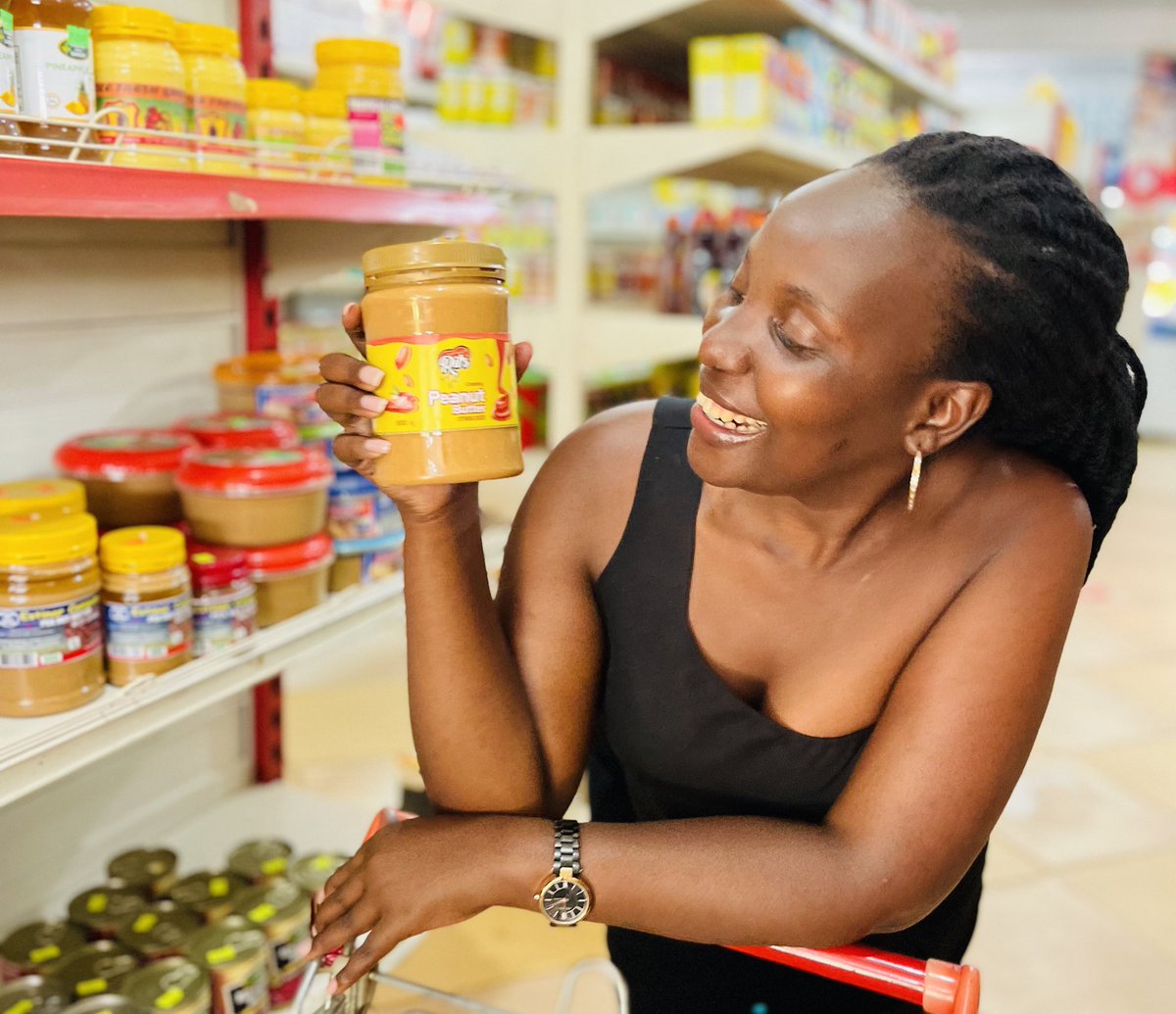 NShaidat's tweet photo. Women in black, happiness is sponsored by #Rils peanut butter, grab yours today in any supermarket around Kampala. https://t.co/gLtcgvdpr5