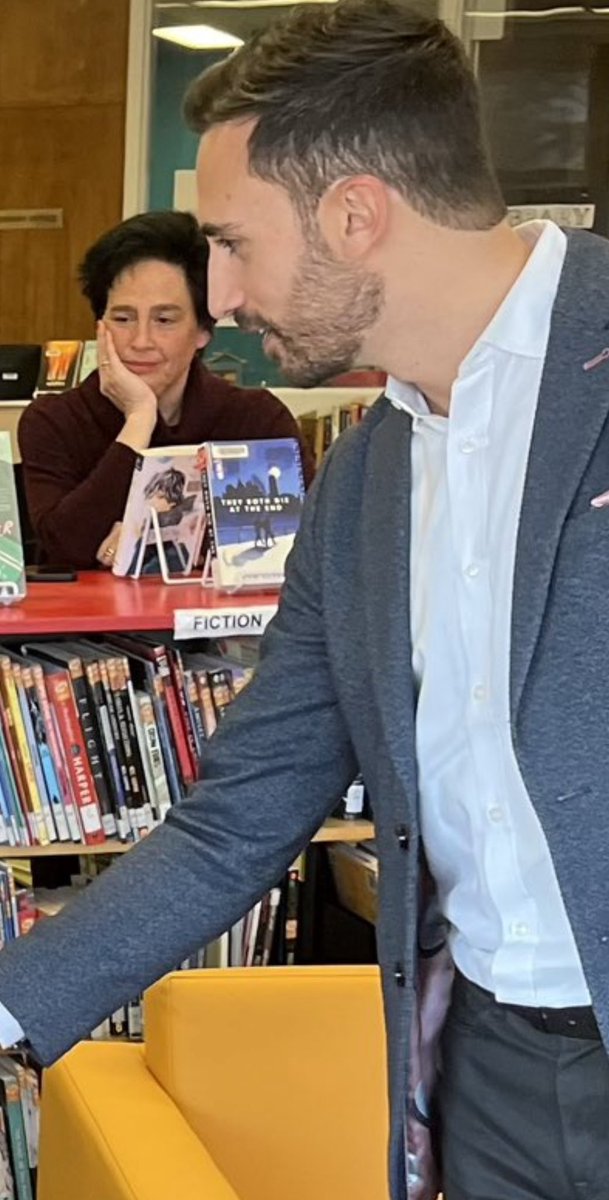 Truth4Ont's tweet image. The most fictitious education minister with a photo op in the fiction section being overseen by the “extreme boredom”gesture is simply magical.
#onpoli #onted