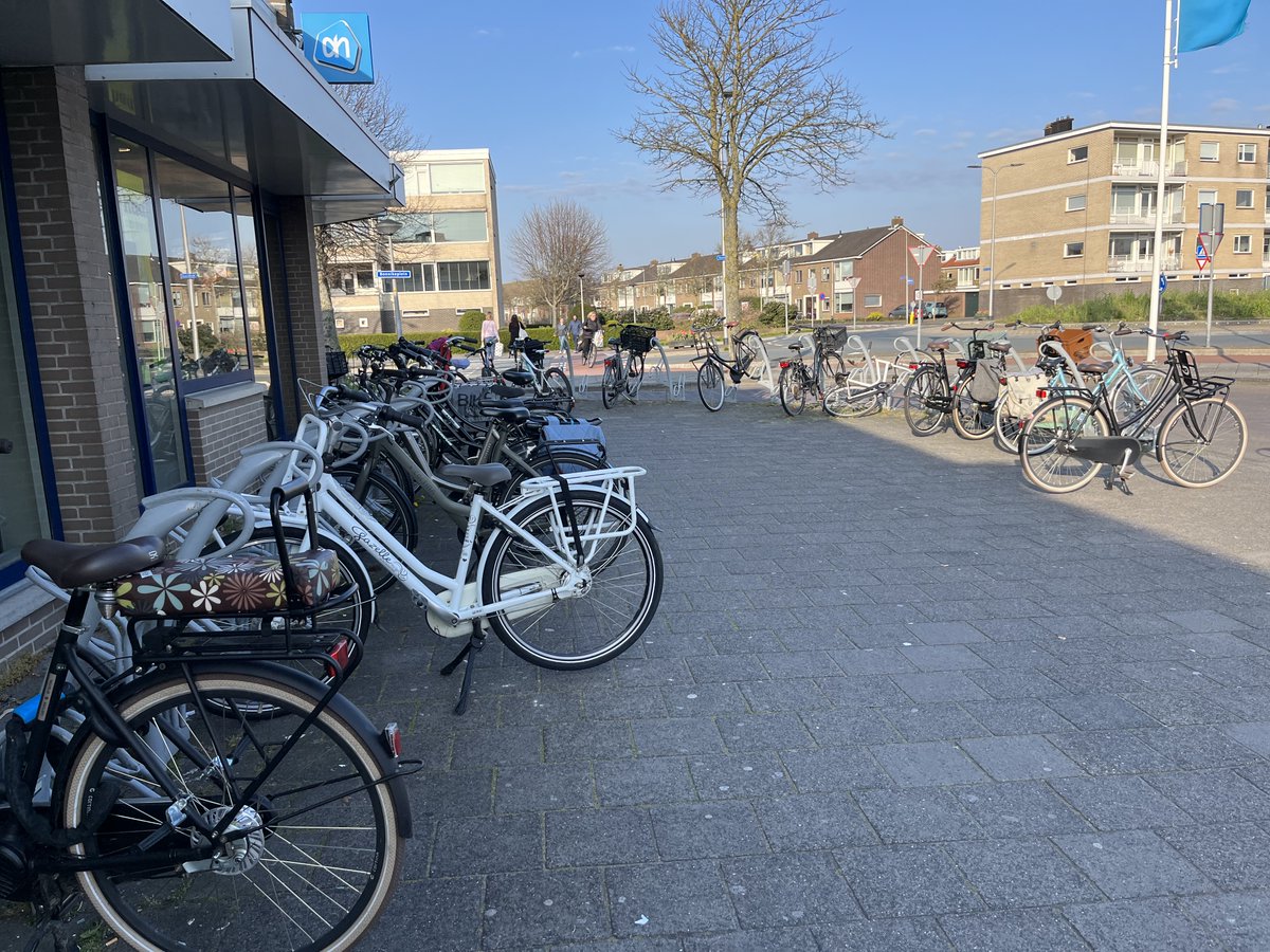 We all know you can not do your shopping by bike. So I have no idea why all the bikes would be parked at the supermarket