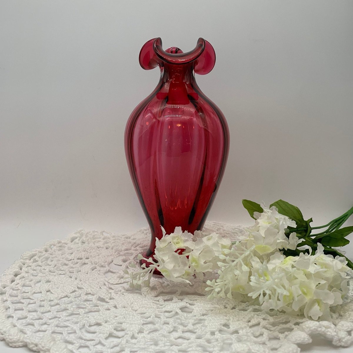 Excited to share this item from my #etsy shop: Vintage Hand Blown Cranberry Vase,  Art Glass Ruby Color Crimped Glass Bud Vase,  Reverse Melon Shabby Cottage  #reversemelonvase #cranberryglassvase #cranberryvase #ruffleglassvase #artglassvase #vintagevase etsy.me/3zTwQdk
