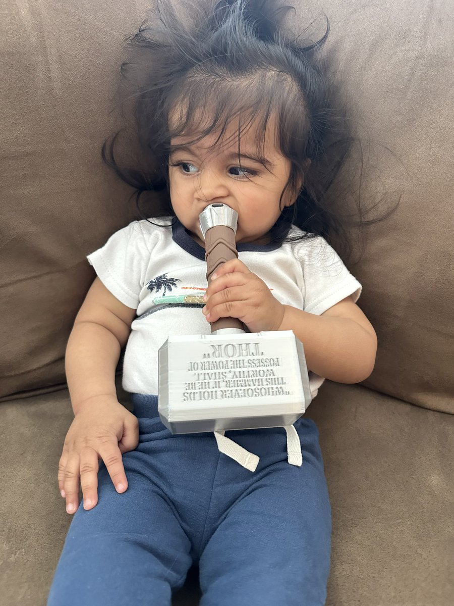 devpanchwagh's tweet photo. Iโm a huge comic nerd, as most of you know. So I just HAD to get my son Krish his own Thor hammer (Mjolnir). Etsy really came through. The detail is incredible. Now he can hammer away, although right now heโs more interested in eating it lol. #Thor #BabyThor https://t.co/n3DbS178cq