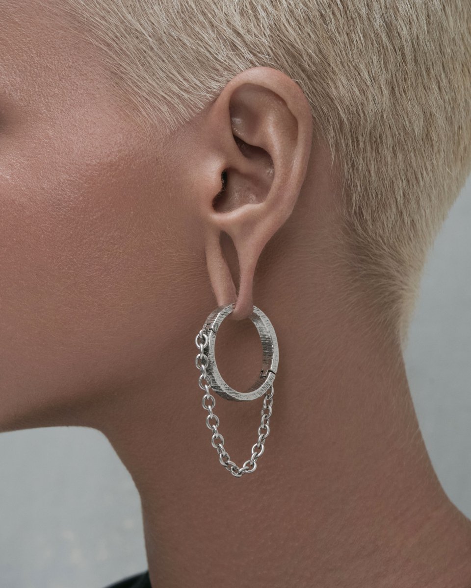 AskEmblaStore's tweet photo. Strength and defiance meet in style when you wear our Crux Chain Hangers – grunged, gritty and bold hoops linked to free-moving chain drops for edgy, moving statements.

Make them yours at https://t.co/lo7D11MSjM.

-

#askandembla #askemblastore https://t.co/RjROhEU3ee