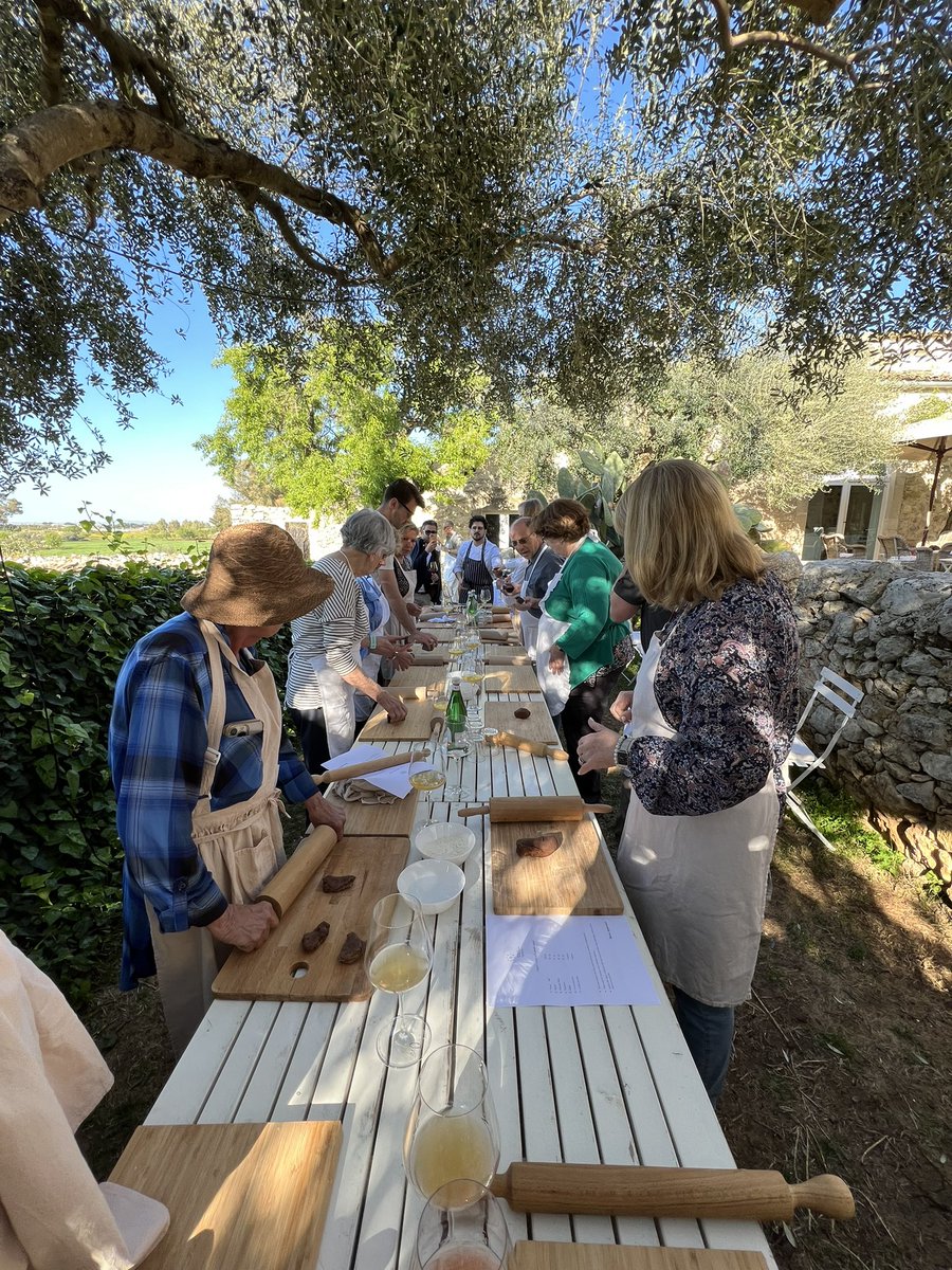 excid3's tweet photo. Making cannoli with Mount Etna in the background. https://t.co/qXrs50qLFH