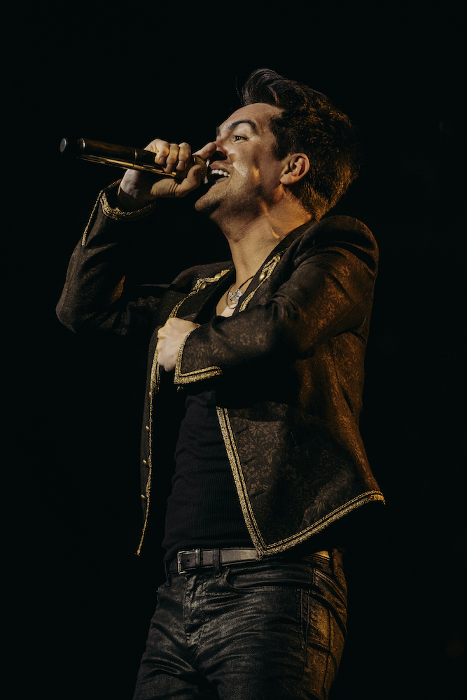 aquarianweekly's tweet photo. Happy birthday to @PanicAtTheDisco's @brendonurie! Here's to the last time we caught the theatrical, big-voiced rocker live (at @TheGarden, no less) ❤️‍🔥 https://t.co/cmZvG5cVw2