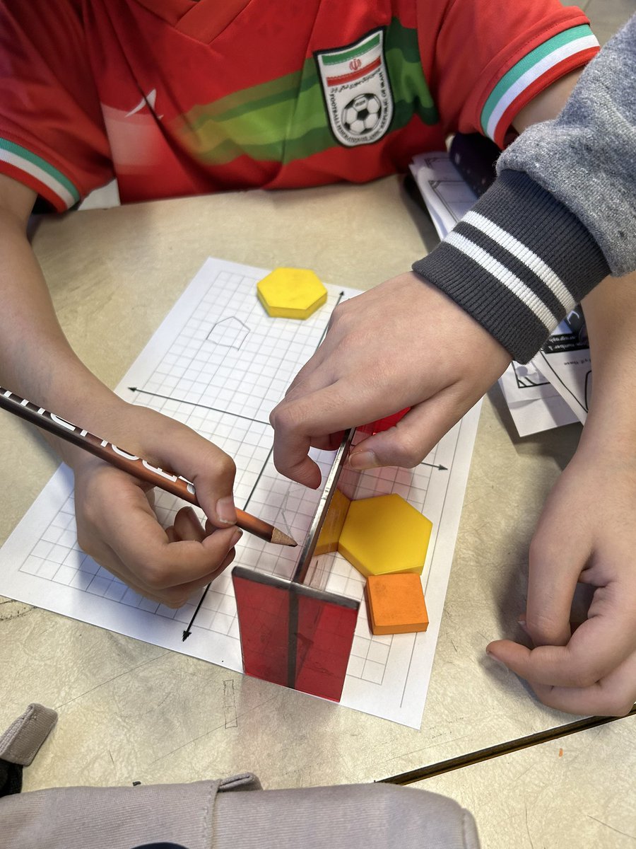 5-1FI loved their hands on activity learning about reflections! Their challenge was to reflect 4 unique shapes across the axis with a mirror. Great job!