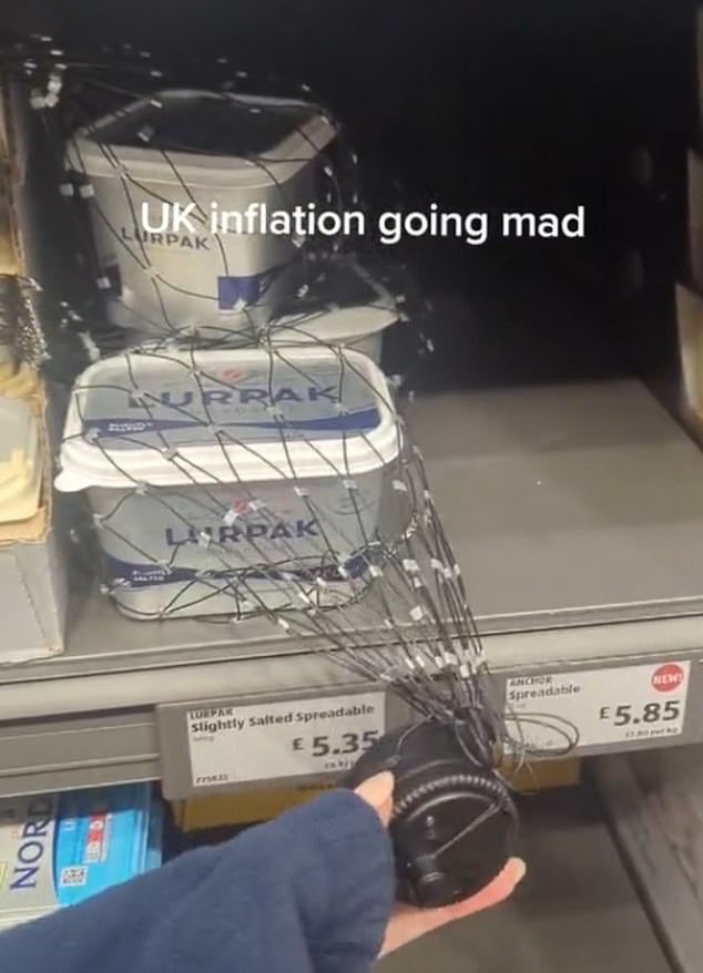 Now Lurpak is locked up in security nets.

Shoppers say inflation is 'going mad' as 600g tub of butter worth £5.35 gets protective measure in Aldi

A customer left dumbfounded after tubs of Lurpak locked in security netting in an Aldi in Kidbrooke, south-east London.