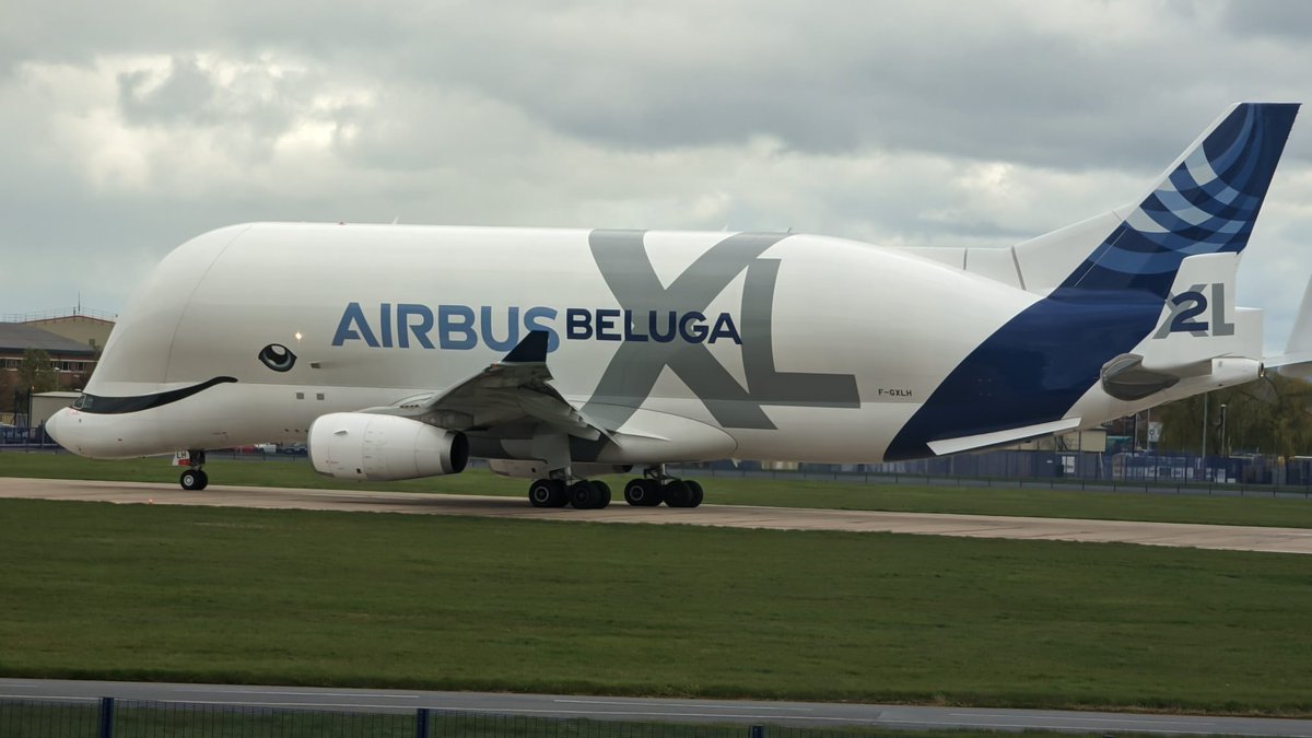 ThatRedMelon's tweet photo. Airbus Beluga XL taking off into a rainbow followed by a second landing afterwards https://t.co/Ktj8Xfi3dp