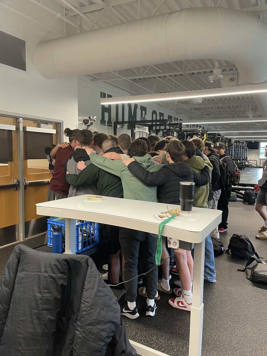 This is John Kemper…the football program after he told them he resigned…he’s in the middle of the best group hug I’ve ever seen!
