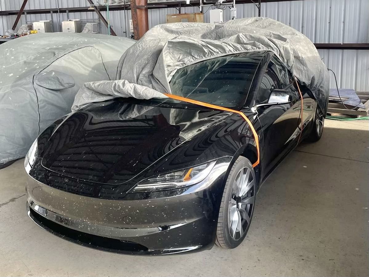 tom_baker's tweet image. Is this our first-ever look at the #ProjectHighland Model 3 #EV facelift? I hope so - those headlights are rad! Hard to make out much inside due to a reflection or shroud over the wheel. New wheel design evident. Photo was posted to Reddit &amp;amp; is linked below.