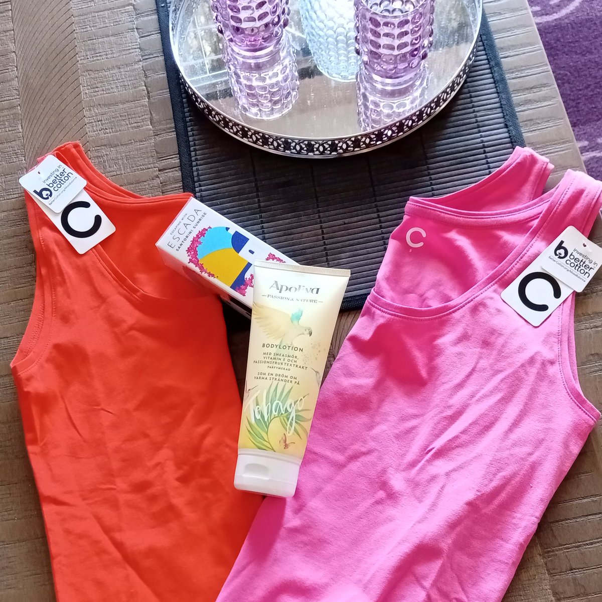 so I did some " I want summer NOW" shopping. 
can a girl have 2many tanks? um not me. Just look at these from #cubus 🤩
the new scent from #escada is WOW! Found it on #kicks 
the bodylotion from #apoliva has been a few for years, perfect for summer if U like tropical scents