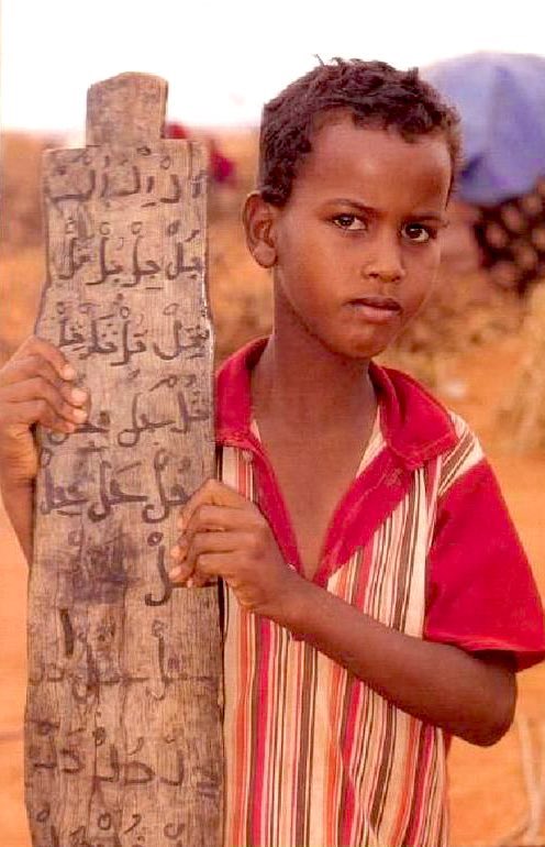 Somali kid practicing Quran💙, but it seems to be disappearing this ways of study and memorizing Quran.