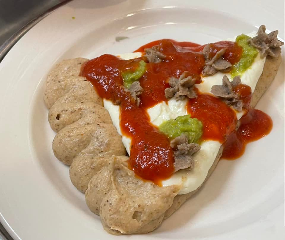 BuildUpRDNs's tweet photo. this is a pureed and hand piped pizza from a long-term care facility in TX for someone who might have chewing or swallowing issues #StopFoodShaming #HospitalFood https://t.co/4PLVMBJvzN