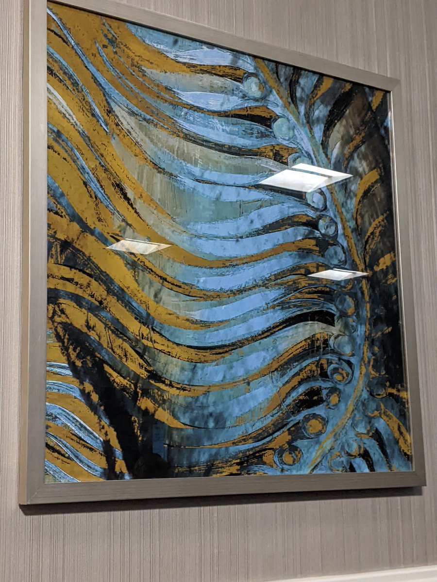 I don't think they put this art up specifically for the #CoastalSediments2023 conference, but they really look like barrier island transgression to me!