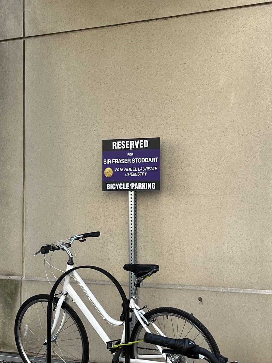 win a nobel prize -> get your own bike rack