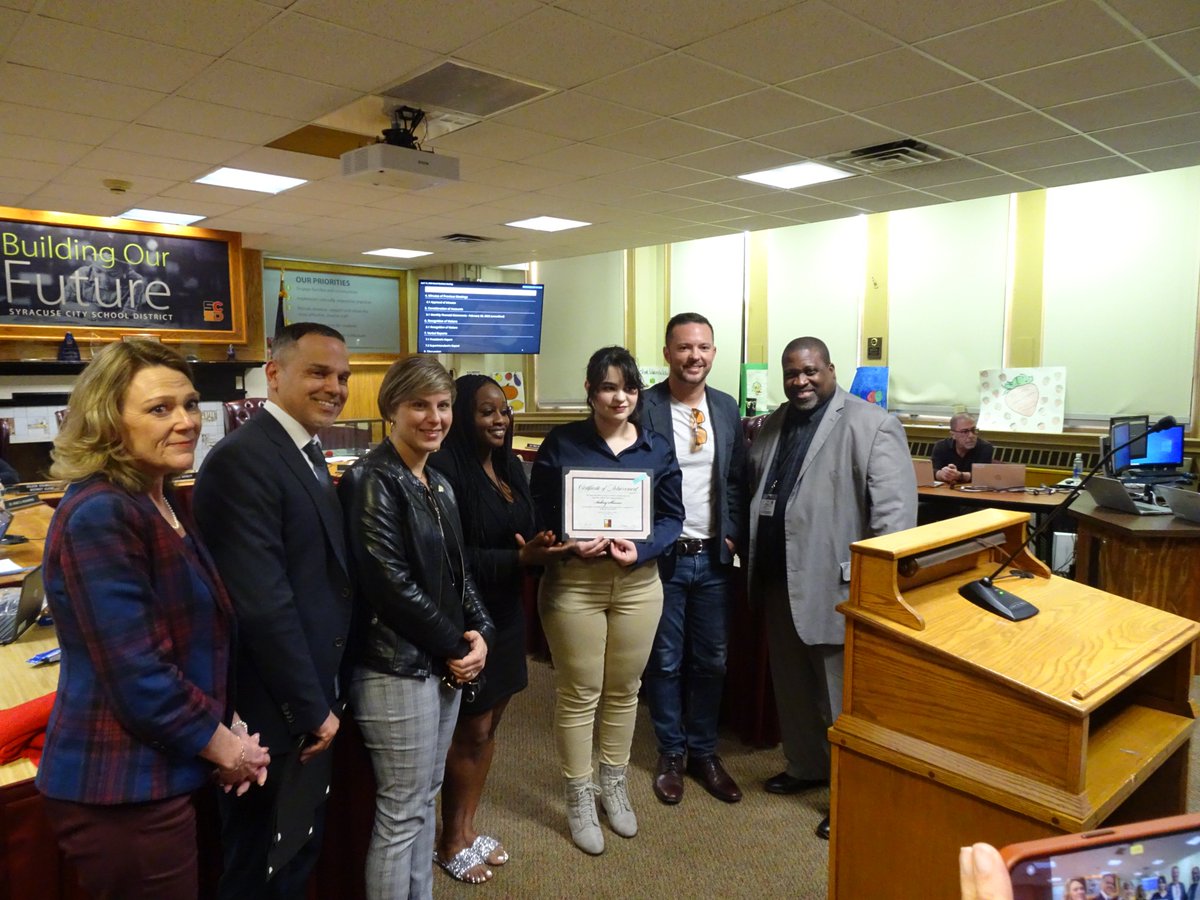 Syracuse City School (@syracuseschools) on Twitter photo .<a href="/HenningerSCSD/">Henninger High School</a> DECA students (including Aubrey Skinner, pictured here) - and advisor Mindy McCarthy - were recognized at this week's Board of Education meeting. They recently qualified to travel to Rochester to compete in a state-level DECA competition! #SCSDSuccess .<a href="/HenningerSCSD/">Henninger High School</a> DECA students (including Aubrey Skinner, pictured here) - and advisor Mindy McCarthy - were recognized at this week's Board of Education meeting. They recently qualified to travel to Rochester to compete in a state-level DECA competition! #SCSDSuccess
