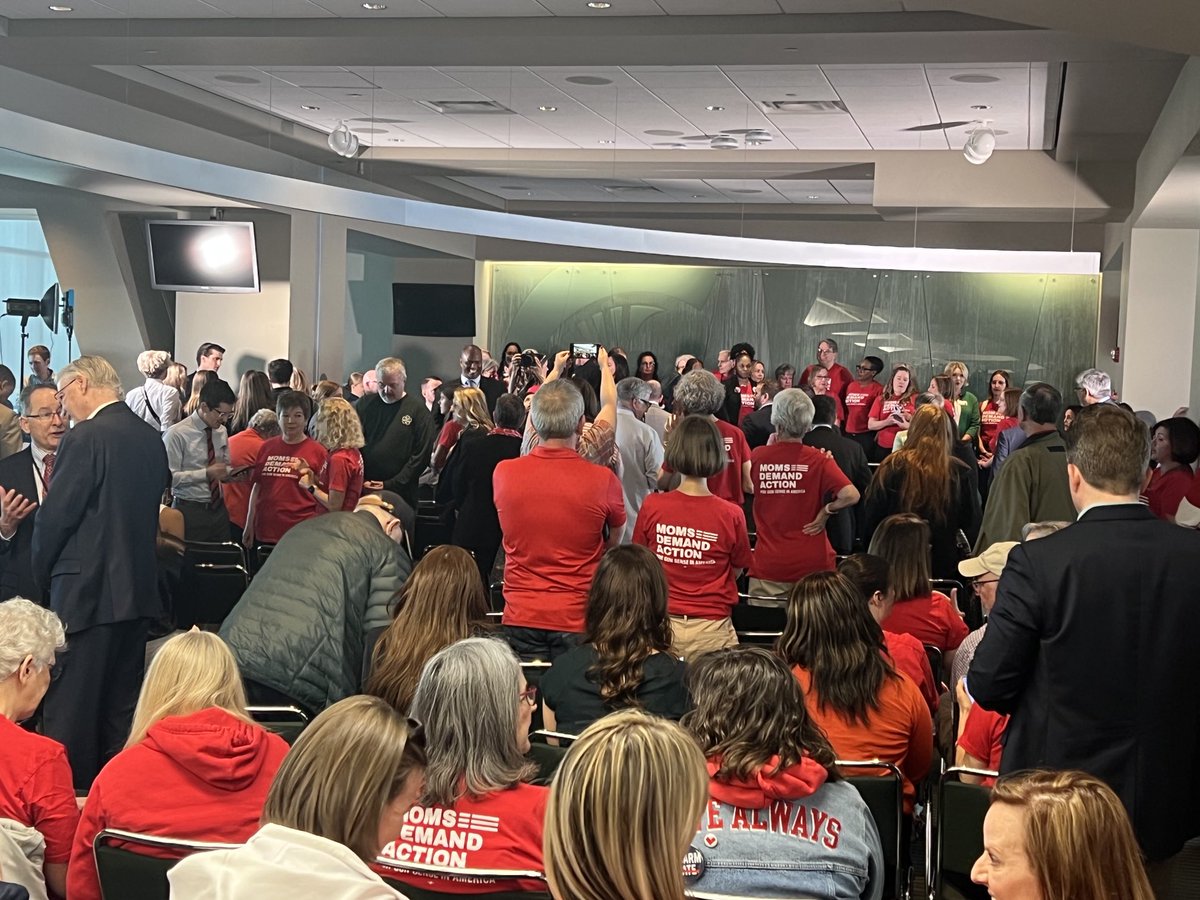 CraigDMauger's tweet photo. Gov. Gretchen Whitmer is about to sign firearm storage and background check bills into law here at Michigan State University. https://t.co/GrsKwlEcIJ